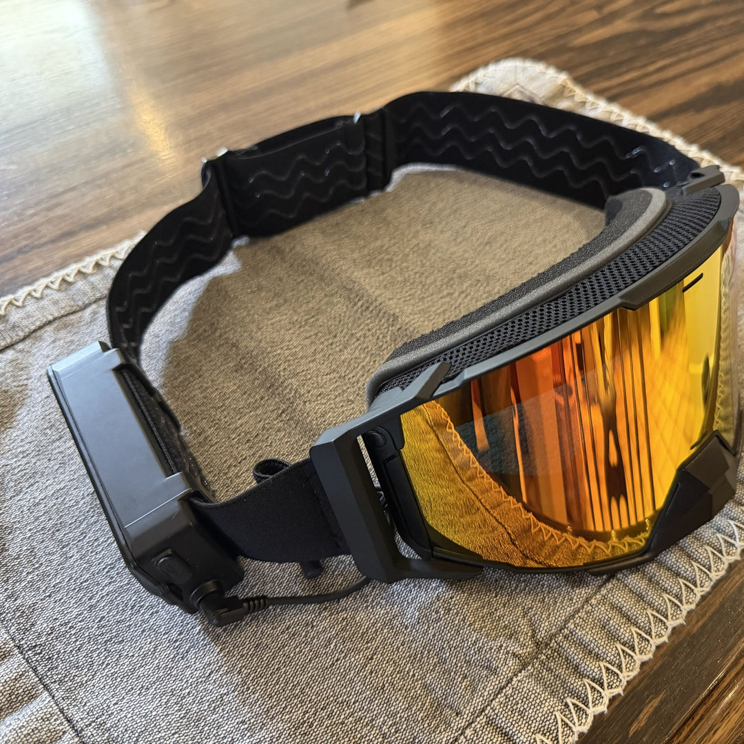 Hillarie heated snowmobile goggle, side angle view with the battery pack #strap_top-secret-1